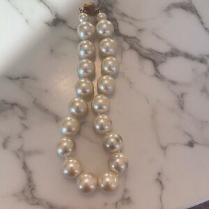 Used: String of faux pearls
